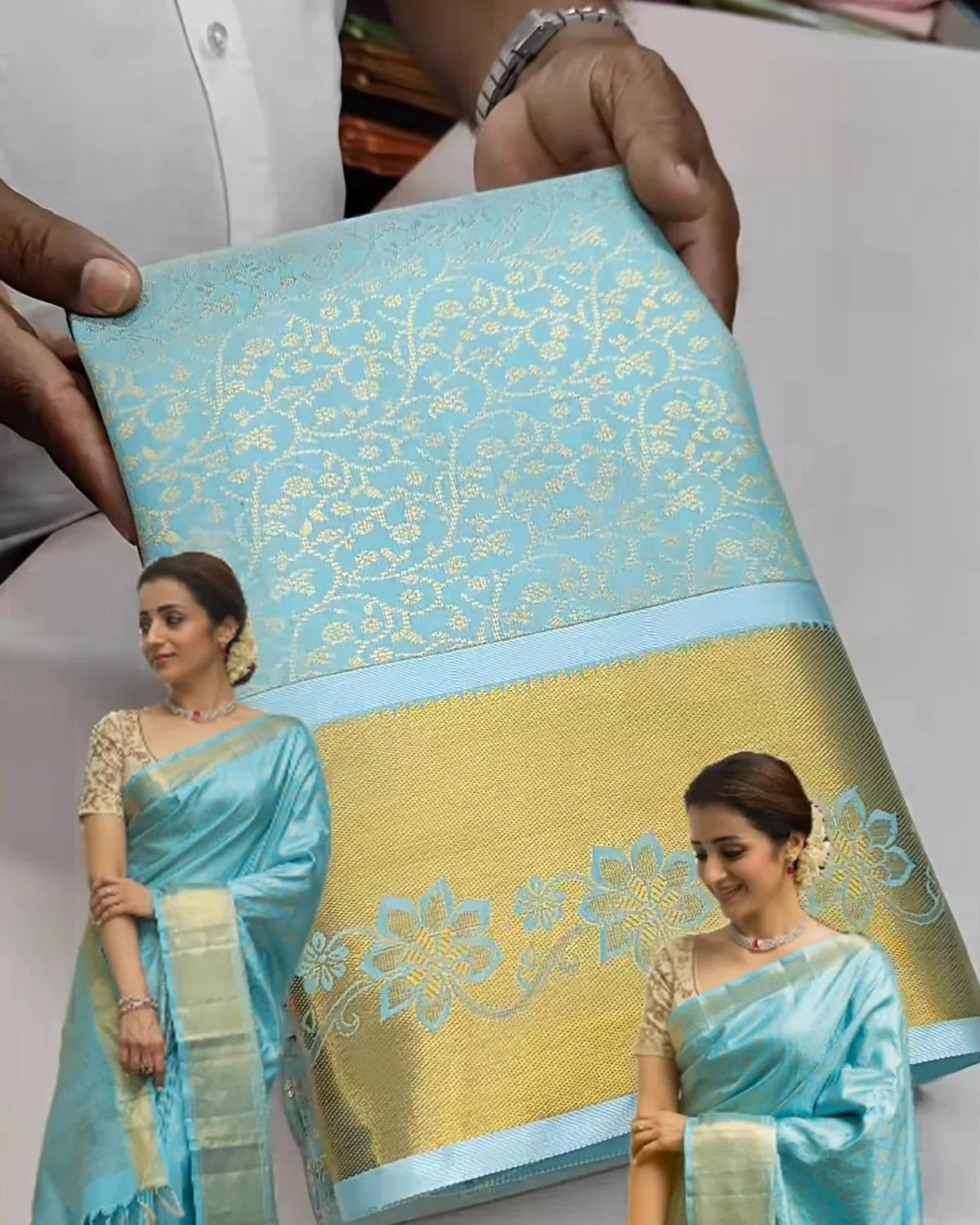 promotional image of a saree with a woman wearing it, held by a person.
