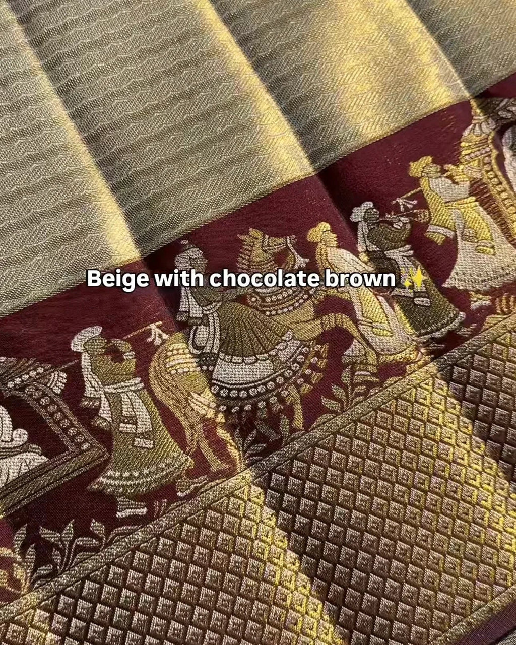 Textile with beige and chocolate brown patterns and designs.