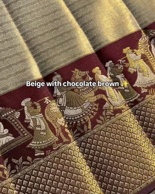 Textile with beige and chocolate brown patterns and designs.