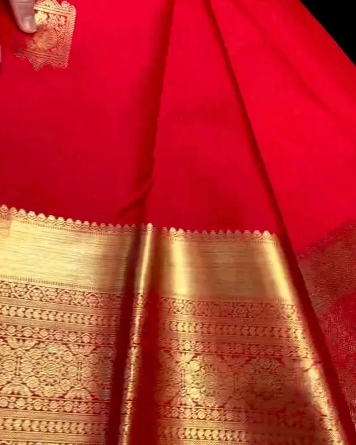 Red Kanjivaram Silk Saree with Rich Gold Zari Border.