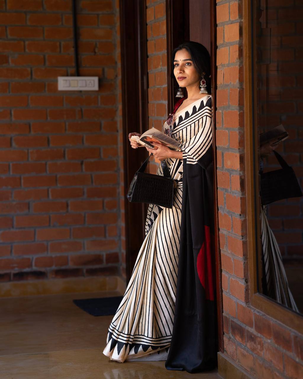 Artisan Saree Crafted in Semi Gaji Silk with Ajrakh Bandhej Patterns