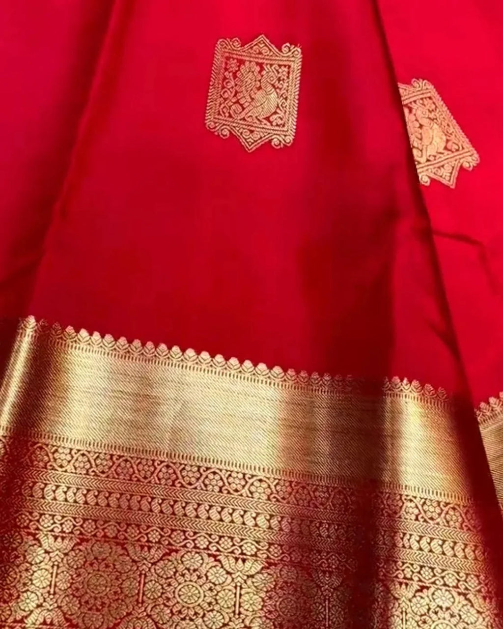 Red Kanjivaram Silk Saree with Rich Gold Zari Border.
